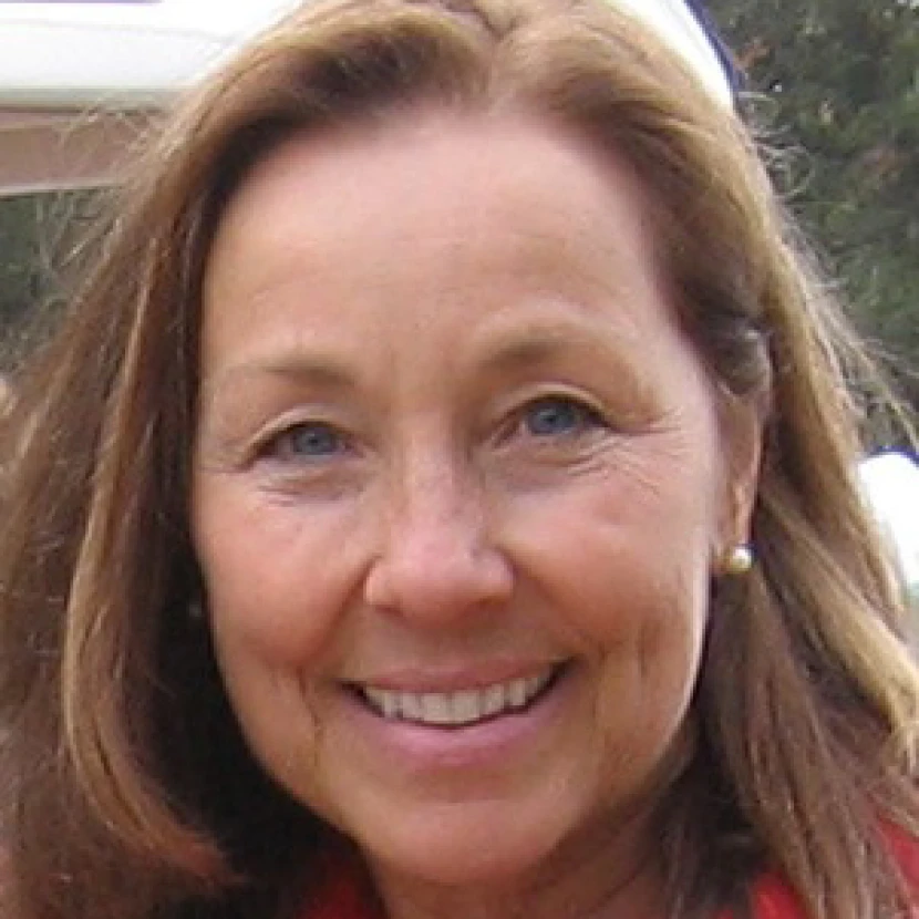 Woman wearing earrings and smiling