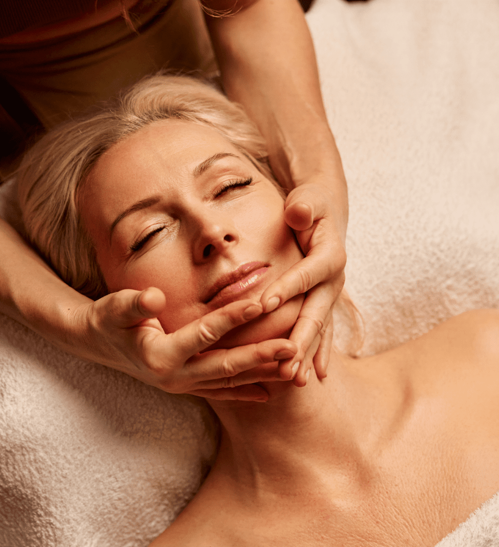 Calm woman enjoying facial therapy