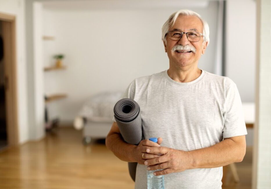 Senior man ready for exercise at home